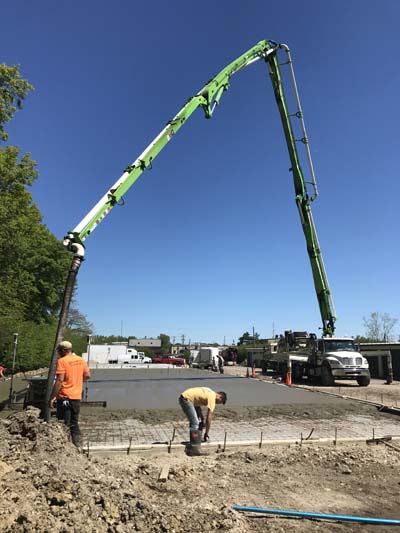 Gold Metal Construction Pouring Concrete